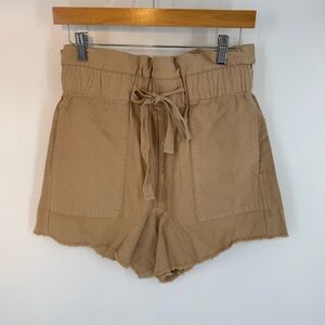 The Great. High-Waisted Drawstring Front Pocket Raw Hem Shorts